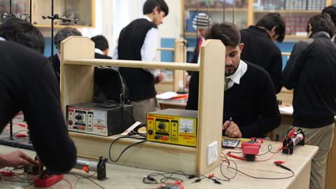 students studying electronics lab