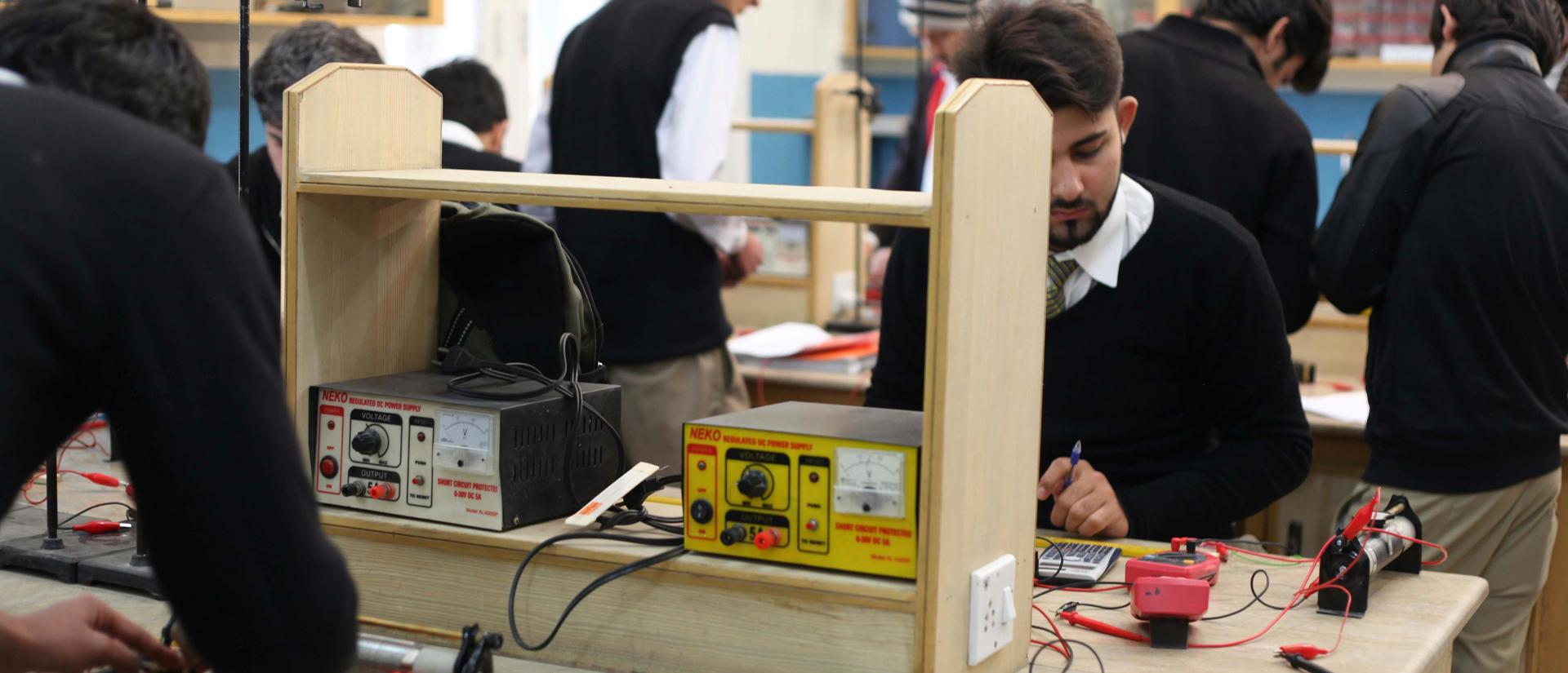students studying electronics lab