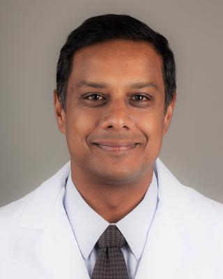 Headshot of Professor Kumar